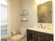 Bathroom with toilet, vanity, and shower at 5335 Saville Dr, Acworth, GA 30101