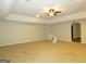 Finished basement with ceiling fan and access to other rooms at 5335 Saville Dr, Acworth, GA 30101