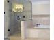 Luxurious bathroom with glass shower and soaking tub at 5335 Saville Dr, Acworth, GA 30101