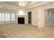 Main bedroom with fireplace, walk-in closet, and coffered ceiling at 5335 Saville Dr, Acworth, GA 30101