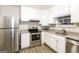 Kitchen with stainless steel appliances and granite counters at 195 Pine Branch Dr, Stockbridge, GA 30281