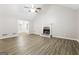 Spacious living room with fireplace and vaulted ceiling at 195 Pine Branch Dr, Stockbridge, GA 30281