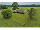 Ranch house situated on a large lot with open fields at 655 Mcdonough Rd, Hampton, GA 30228