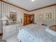 Bedroom with a dresser and queen-size bed, window view at 655 Mcdonough Rd, Hampton, GA 30228
