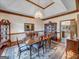 Formal dining room with a large table, chandelier, and hardwood floors at 655 Mcdonough Rd, Hampton, GA 30228