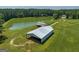 Large metal barn situated on spacious property at 655 Mcdonough Rd, Hampton, GA 30228
