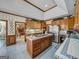 Spacious kitchen with island, stainless steel appliances, and ample cabinet space at 655 Mcdonough Rd, Hampton, GA 30228