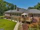 Brick house with large deck and backyard at 655 Mcdonough Rd, Hampton, GA 30228
