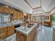 Eat-in kitchen with breakfast nook, island, and hardwood floors at 655 Mcdonough Rd, Hampton, GA 30228