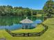 Picturesque gazebo overlooking a serene pond at 655 Mcdonough Rd, Hampton, GA 30228