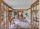 Bright living room featuring hardwood floors and ample natural light at 655 Mcdonough Rd, Hampton, GA 30228