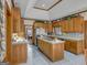 Large kitchen with island, stainless steel appliances, and blue tile at 655 Mcdonough Rd, Hampton, GA 30228