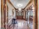 Elegant entryway with marble flooring, chandelier, and classic decor at 655 Mcdonough Rd, Hampton, GA 30228