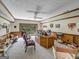 Home office with wood desk, leather chairs, and backyard views at 655 Mcdonough Rd, Hampton, GA 30228