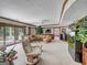 Bright basement Gathering room featuring a large sectional sofa and backyard access at 655 Mcdonough Rd, Hampton, GA 30228