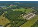 Aerial view of new home community nestled in lush green landscape at 655 Mcdonough Rd, Hampton, GA 30228
