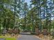 Ornate iron gate and brick pillars at property entrance at 655 Mcdonough Rd, Hampton, GA 30228