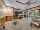 Elegant living room featuring a spiral staircase, high ceilings and large TV at 655 Mcdonough Rd, Hampton, GA 30228