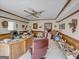 Spacious home office with large desk, sitting area, and adjacent bedroom access at 655 Mcdonough Rd, Hampton, GA 30228