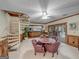 Basement recreation area with spiral staircase, wet bar, and seating at 655 Mcdonough Rd, Hampton, GA 30228