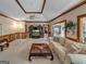 Living room with high ceilings, a large TV, and access to the sunroom at 655 Mcdonough Rd, Hampton, GA 30228