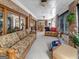 Relaxing sunroom featuring comfortable seating and access to outdoor patio at 655 Mcdonough Rd, Hampton, GA 30228