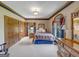 Bright bedroom with large windows and wooden furniture at 655 Mcdonough Rd, Hampton, GA 30228