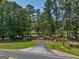 Brick entrance gate with iron details leads to property at 655 Mcdonough Rd, Hampton, GA 30228