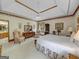 Main bedroom featuring carpeted floors, king-size bed and access to bathroom at 655 Mcdonough Rd, Hampton, GA 30228