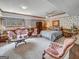 Charming basement bedroom with antique furniture and sitting area at 655 Mcdonough Rd, Hampton, GA 30228