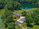 Large home with a detached garage, pond, and expansive property at 655 Mcdonough Rd, Hampton, GA 30228