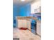 Open concept kitchen with stainless steel appliances at 12 Intown Pl, Fayetteville, GA 30214