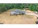 Ranch house with a shed and spacious yard at 409 N Green Cir, Mcdonough, GA 30252