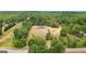House on a large lot with wooded surroundings at 409 N Green Cir, Mcdonough, GA 30252