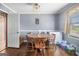 Dining area with a round table and four chairs at 409 N Green Cir, Mcdonough, GA 30252