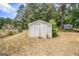 Small wooden shed in the backyard at 409 N Green Cir, Mcdonough, GA 30252