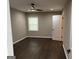 Bedroom with ceiling fan and hardwood floors at 1901 Maywood Nw Pl, Atlanta, GA 30318