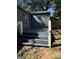 Gray deck with white railings and steps leading to the yard at 1901 Maywood Nw Pl, Atlanta, GA 30318