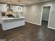 Modern kitchen with island and stainless steel appliances at 1901 Maywood Nw Pl, Atlanta, GA 30318
