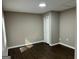 Bright bedroom with dark hardwood floors and spacious closet at 1901 Maywood Nw Pl, Atlanta, GA 30318