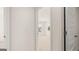 Hallway view of a bedroom with window and neutral decor at 660 Edgar St # 158, Hampton, GA 30228