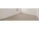 Simple bedroom with a window and neutral carpeting at 660 Edgar St # 158, Hampton, GA 30228