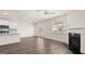 Open living space with kitchen, fireplace and hardwood floors at 660 Edgar St # 158, Hampton, GA 30228