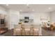 Modern kitchen with island and stainless steel appliances at 660 Edgar St # 158, Hampton, GA 30228