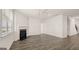 Living room with fireplace and hardwood floors at 660 Edgar St # 158, Hampton, GA 30228