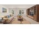 Living room with comfortable seating and built-in shelving at 660 Edgar St # 158, Hampton, GA 30228