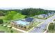 Aerial view of community pool, playground, and homes at 660 Edgar St # 158, Hampton, GA 30228
