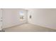 Bright bedroom with carpeted floor and large window offering natural light at 660 Edgar St # 158, Hampton, GA 30228