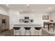 Modern kitchen with island and stainless steel appliances at 660 Edgar St # 158, Hampton, GA 30228