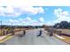 Gated community entrance with iron fencing and landscaping at 660 Edgar St # 158, Hampton, GA 30228
